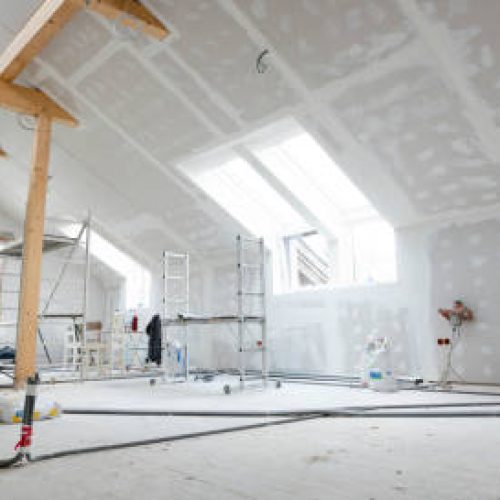 Plaster Repairs Romeos Attic finishing construction site in the phase drywall spackling and plastering before screeding
